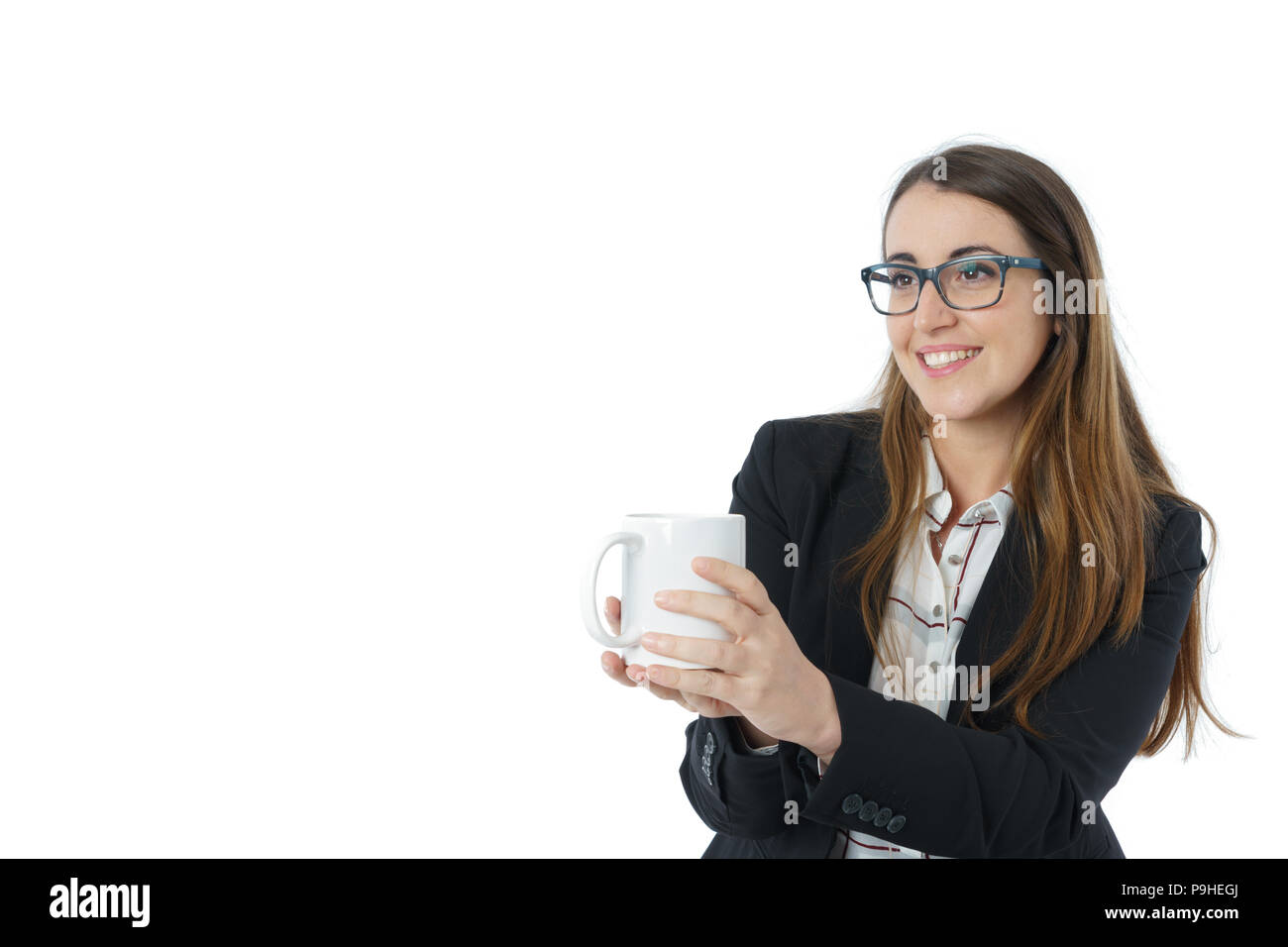 Frau in Anzug mit einer Tasse Tee Stockfoto