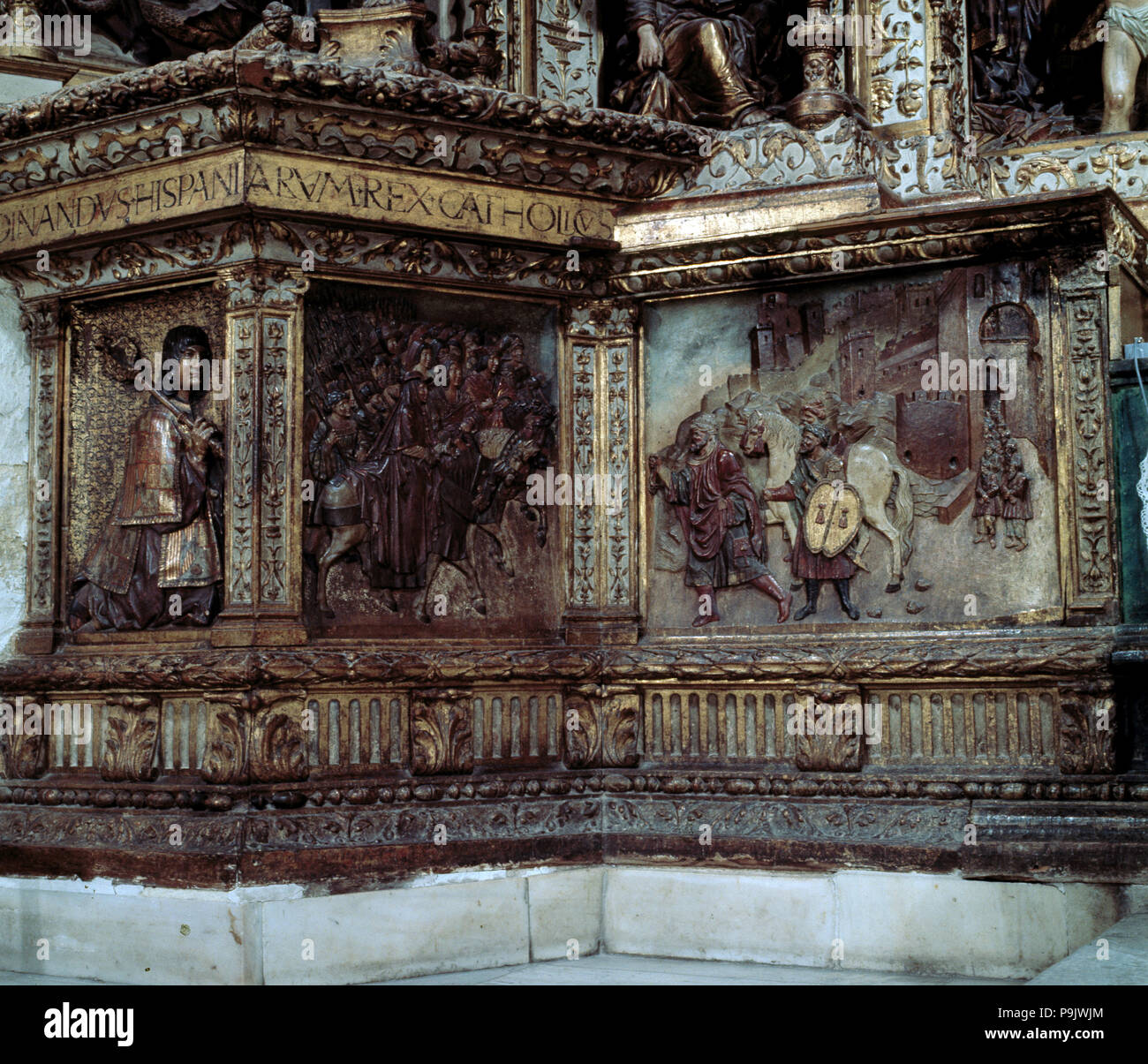 Detail der Predella des Altars der Königlichen Kapelle von Granada mit den Reliefs der conque… Stockfoto