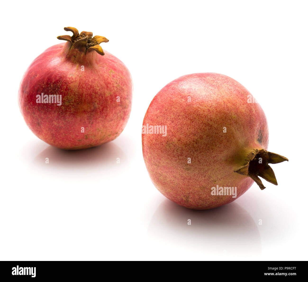 Granatapfel isoliert auf weißem Hintergrund Paar Stockfoto