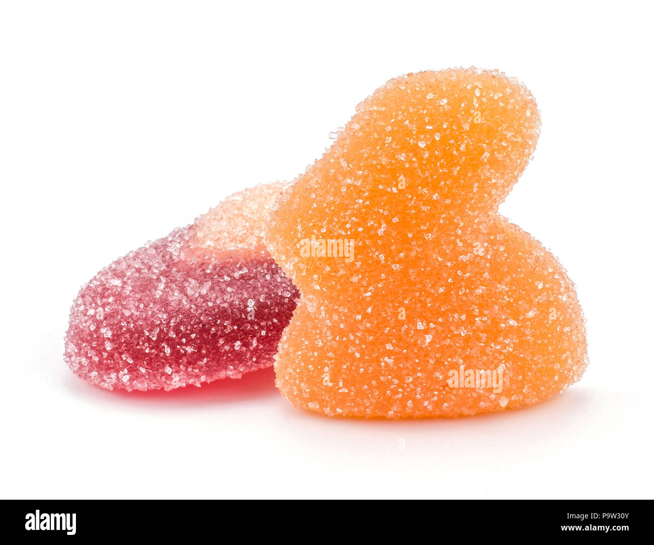 Orange Ostern jelly Osterhase mit einem crimson Ei auf weißem Hintergrund zwei Marmelade Süßigkeiten isoliert Stockfoto