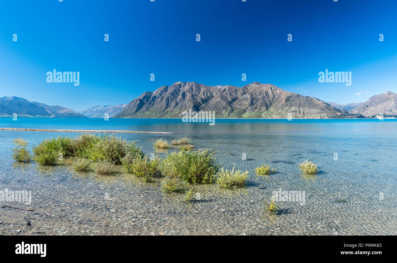 Lake Hawea, klaren See mit Bergen, Region Otago, Südinsel, Neuseeland Stockfoto