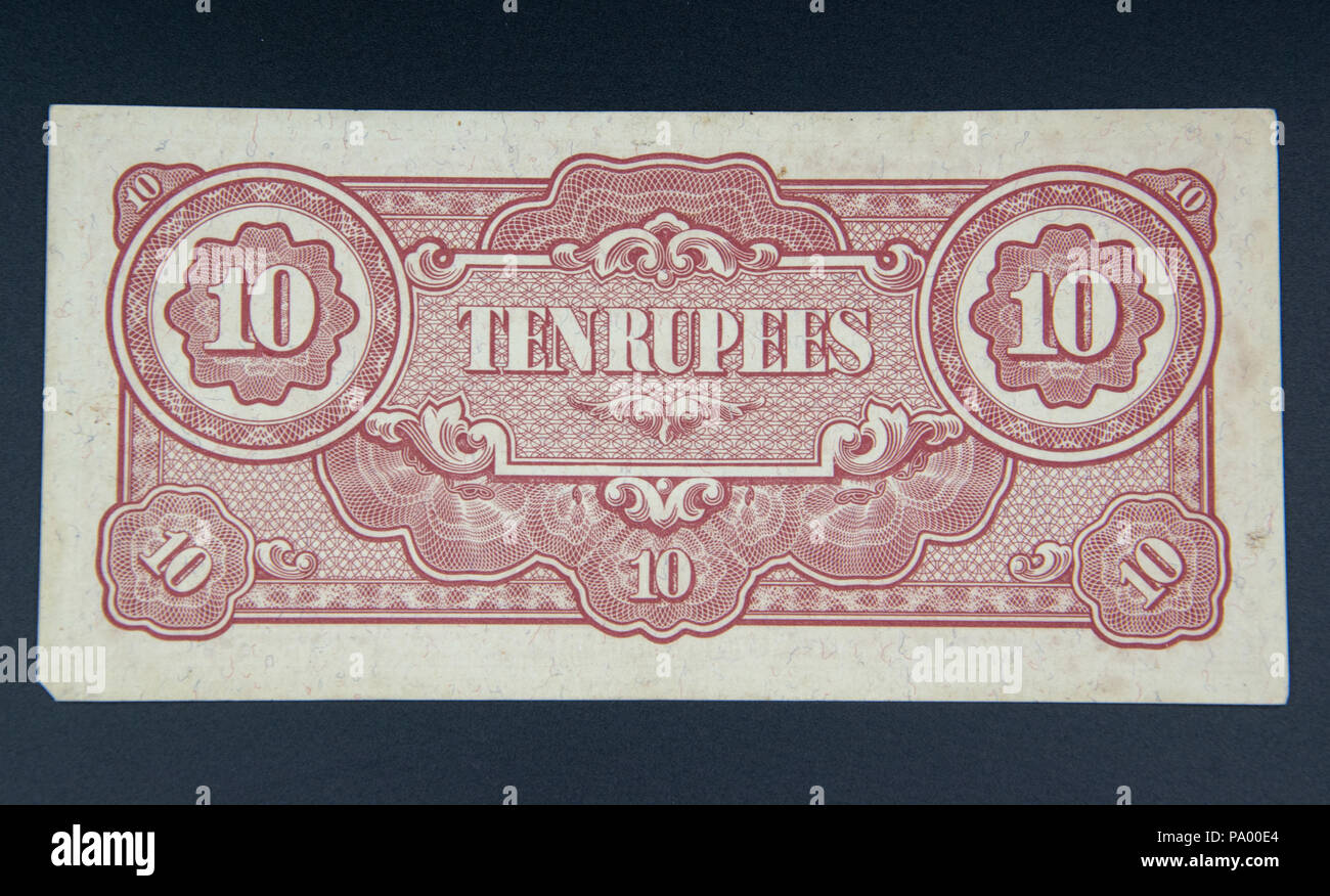 10 Rupee Hinweis durch das japanische Militär Behörde in Birma ausgestellt als japanische Invasion Geld als Ersatz für die lokale Währung während der Japanischen oc Stockfoto