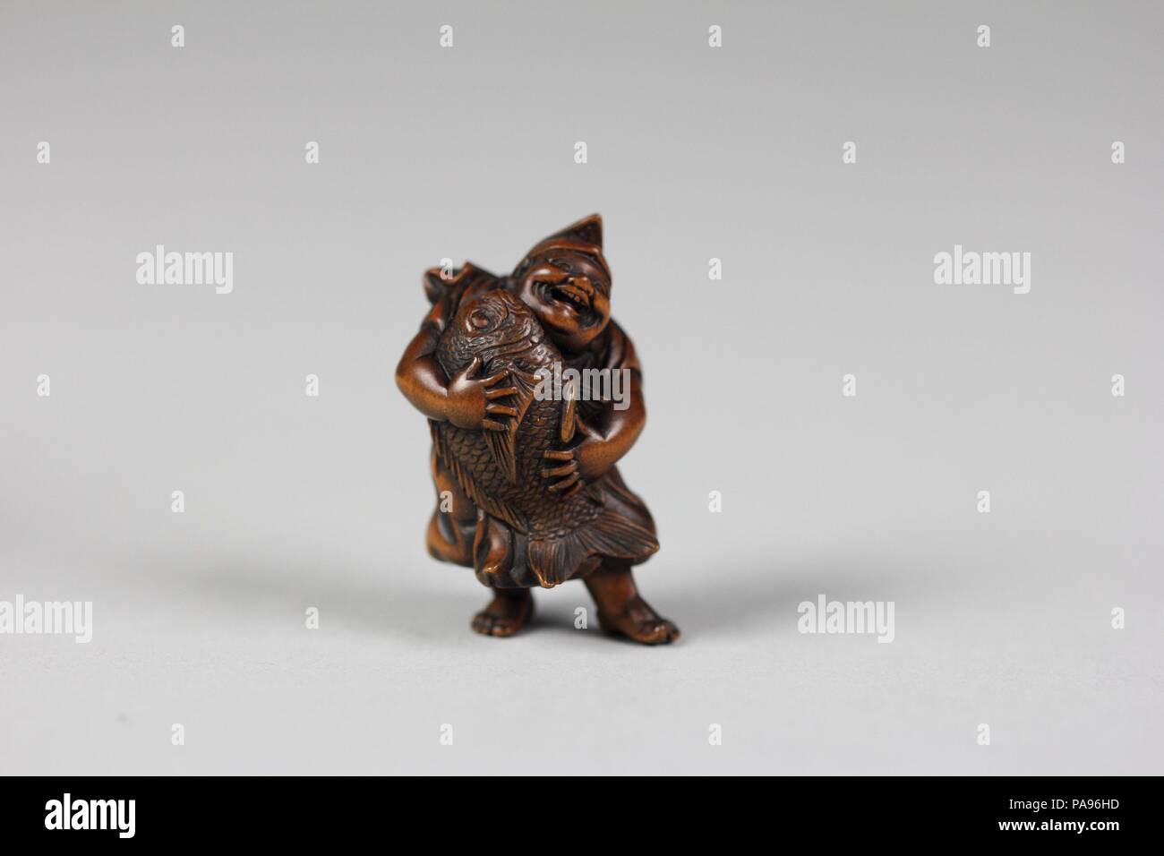 Der Netsuke Ebisu. Kultur: Japan. Abmessungen: H. 1 1/2 in. (3,8 cm); W. 1. (2,5 cm); D. 7/8 in. (2.2 cm). Datum: 19. Museum: Metropolitan Museum of Art, New York, USA. Stockfoto