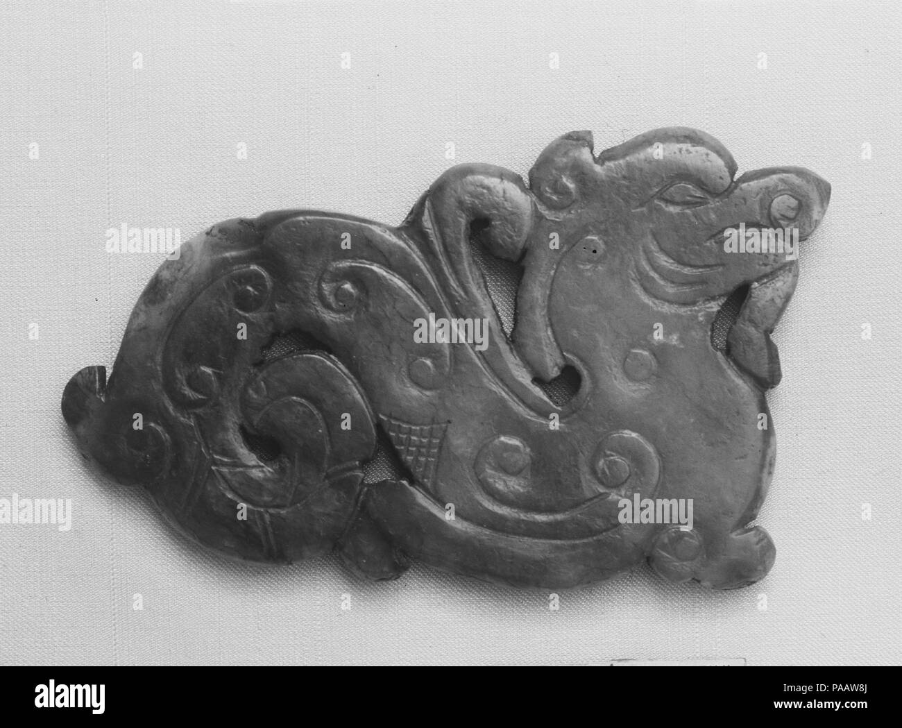 Gürtel Verzierung. Kultur: China. Abmessungen: H. 1 5/8 in. (4,1 cm); W. 2 3/4 in. (7 cm); D. 1/4 in. (5,6 cm). Museum: Metropolitan Museum of Art, New York, USA. Stockfoto