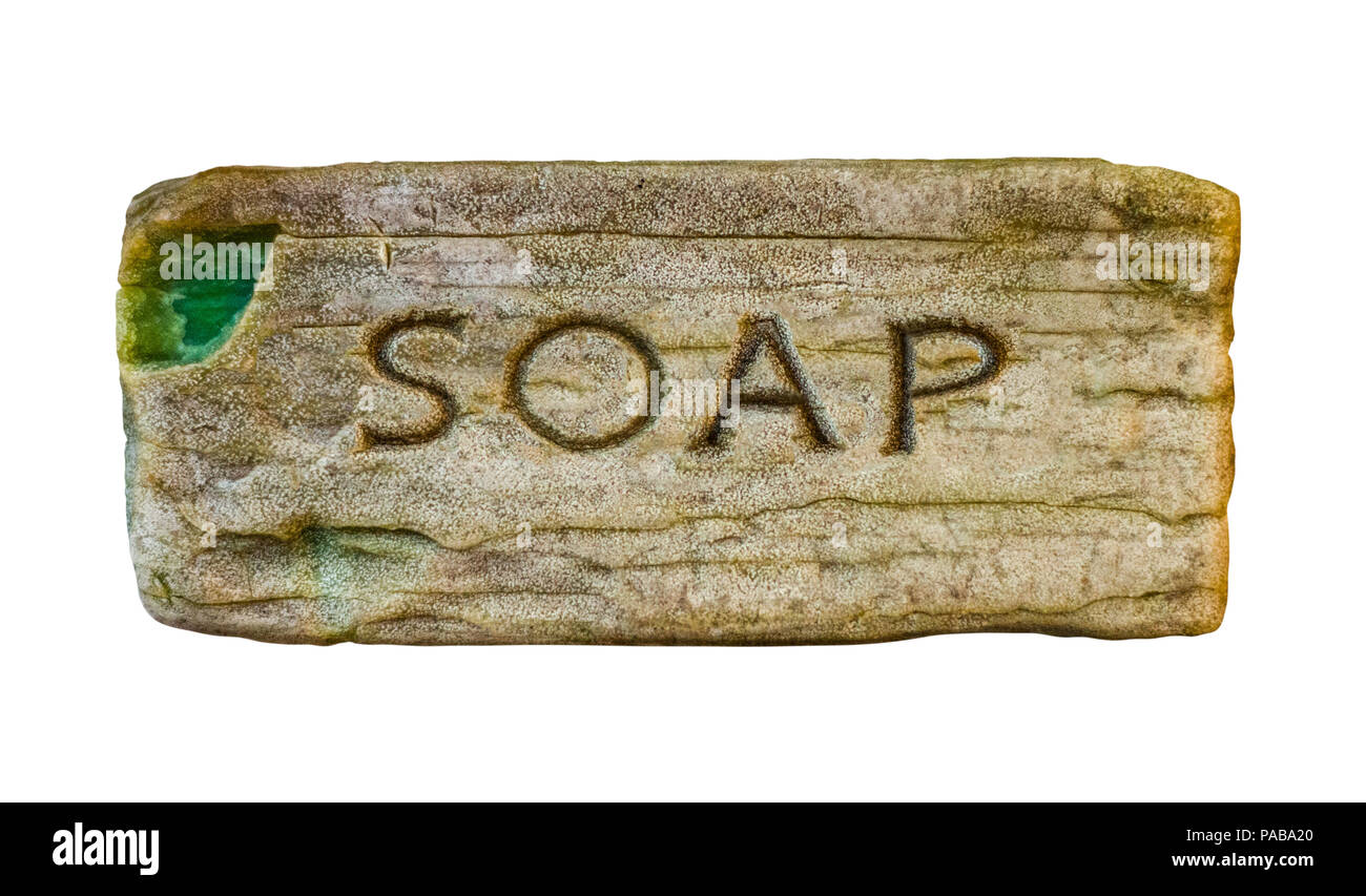 Isolierte Vintage Bar oder Stück Seife mit dem Wort Soap geprägte Stockfoto