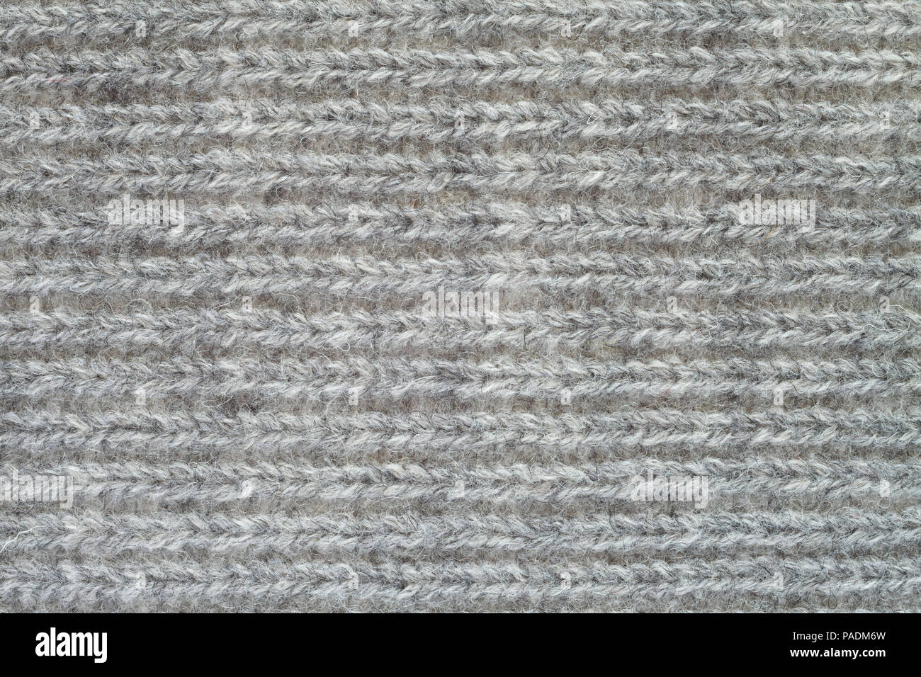 Grauen pullover Textur Hintergrund Stockfoto