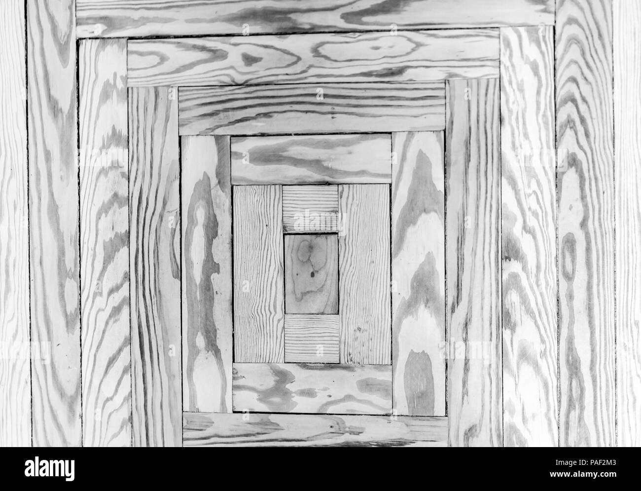 Detail Bild von einem einfachen Muster in einer Bodenplatte aus Holz Stockfoto