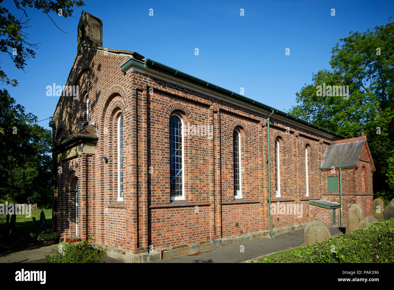 Chelford Gemeinde in Cheshire, England, All Saints Church, Marthall Ziegelgebäude Stockfoto