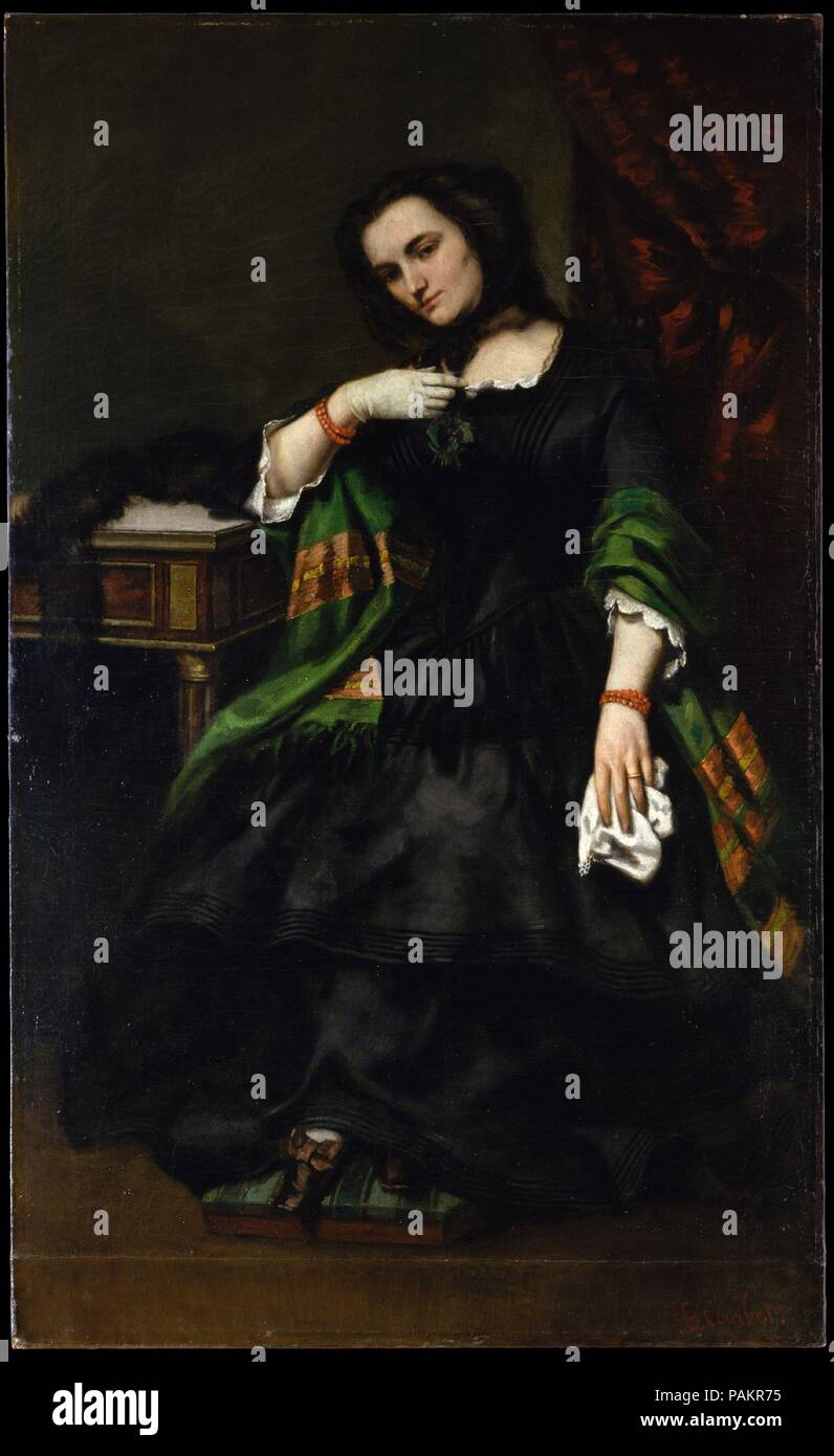 Madame Auguste Cuoq (Mathilde Desportes, 1827-1910). Künstler: Gustave Courbet (Französisch, Ornans 1819-1877 La Tour-de-Peilz). Abmessungen: 69 1/2 x 42 1/2 in. (176,5 x 108 cm). Datum: Ca. 1852-57. Mehrere Künstler wagte, Porträts von Mathilde Desportes, einschließlich der beliebten Akademiemitglied Jean-Jacques Henner (1829-1905), aber ihr Mann, Auguste Cuoq, fanden die meisten von ihnen nicht akzeptabel. Diese Ähnlichkeit war unter denen, die er abgelehnt, angeblich, weil er glaubte, dass es nicht ausreichend die Schönheit seiner Frau vermitteln. Courbet erscheint das Bild zu seiner eigenen Zufriedenheit in 1857 abgeschlossen haben, das Datum, die er zuweisen Stockfoto