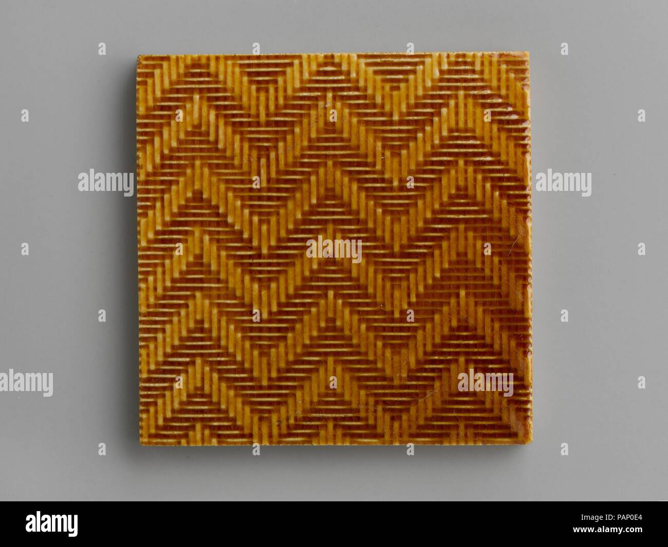 Fliese. Kultur: American. Abmessungen: 6 1/8 x 3 1/8 in. (15,6 x 7,9 cm). Hersteller: J. und J. G. geringe Kunst Fliesen Werke (1877-1907). Datum: Ca. 1882-84. Museum: Metropolitan Museum of Art, New York, USA. Stockfoto