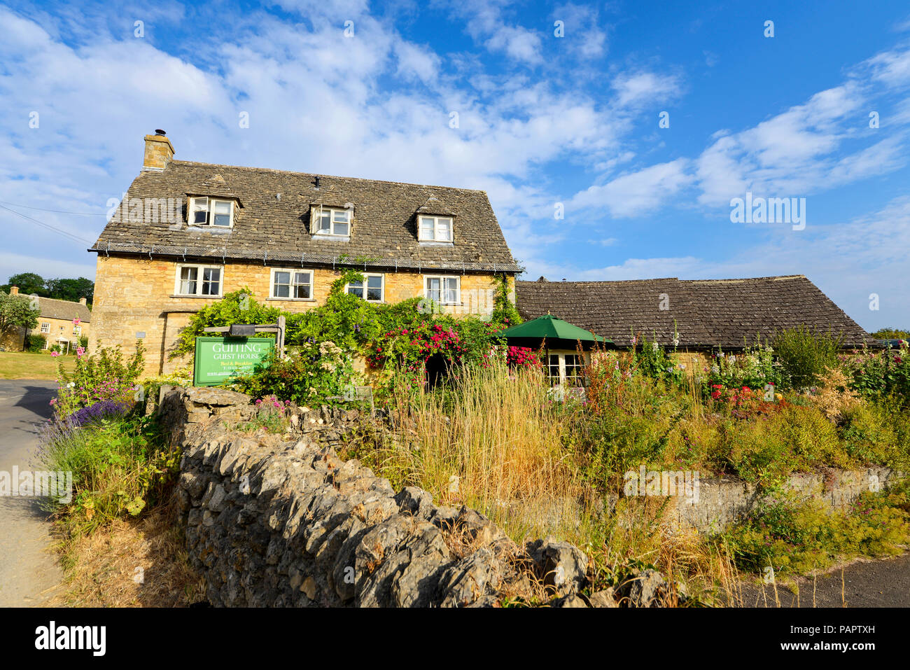 Guiting Guest House in Guiting Macht, einem kleinen Dorf in der Grafschaft Gloucestershire Cotswolds, England, UK. Unterkunft Stockfoto
