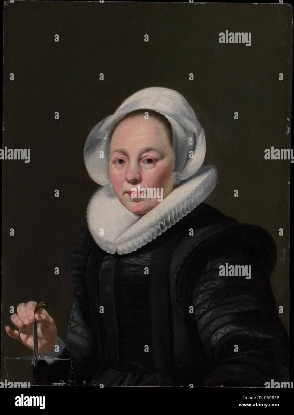 Porträt einer Frau mit einer Balance. Artist: Thomas De Keyser (Niederländisch, Amsterdam (?) 1596/97 -1667 Amsterdam). Abmessungen: 9 1/8 x 6 7/8 in. (23,2 x 17,5 cm). Datum: Ca. 1625-26. Der Mann ist eine Shell, Sammler, in einem Alter, wenn aussenhandel bis eine breite Welt der natürlichen Kuriositäten geöffnet. Seine Frau hält ein Gleichgewicht, das Symbol der Tugend der Mäßigung. De Keyser war einer der führenden portraitists in Amsterdam während der 1620er und 1630er Jahren. Er ist am besten für kleine voller Länge Porträts bekannt, aber er auch lackiert große Gruppe Porträts und kleine Büste und halber Länge Porträts. Museum: Metropolitan Museum von eine Stockfoto