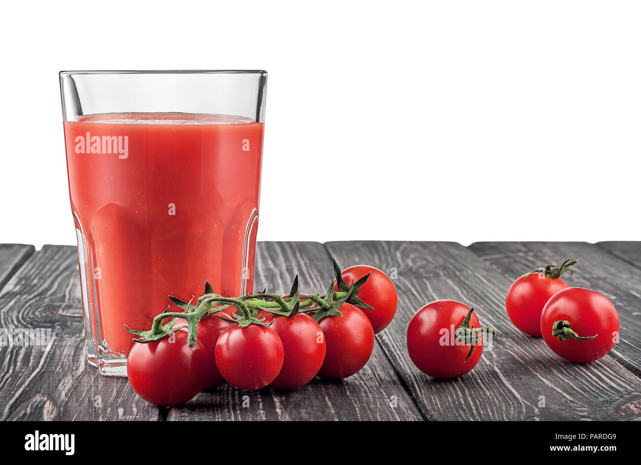 Cherry Tomaten und Tomatensaft Stockfoto