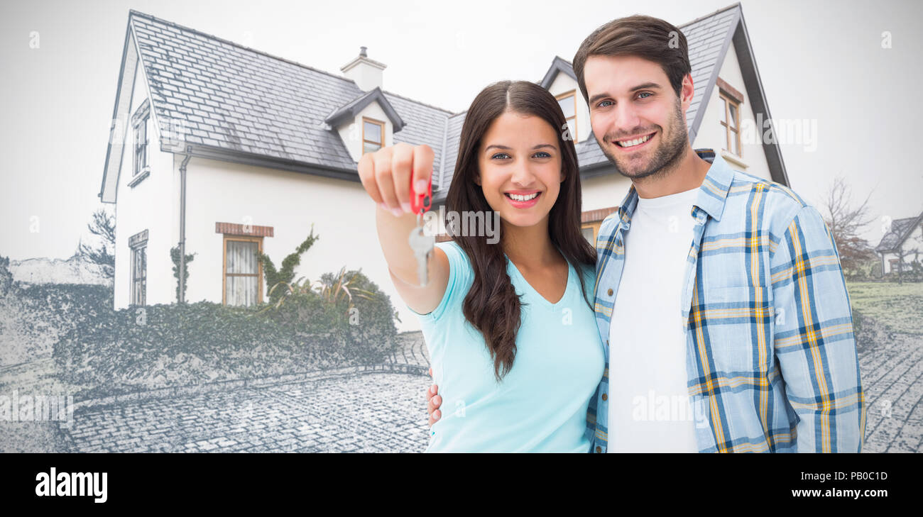 Zusammengesetztes Bild des jungen Brautpaares zeigt neuen Hausschlüssel Stockfoto