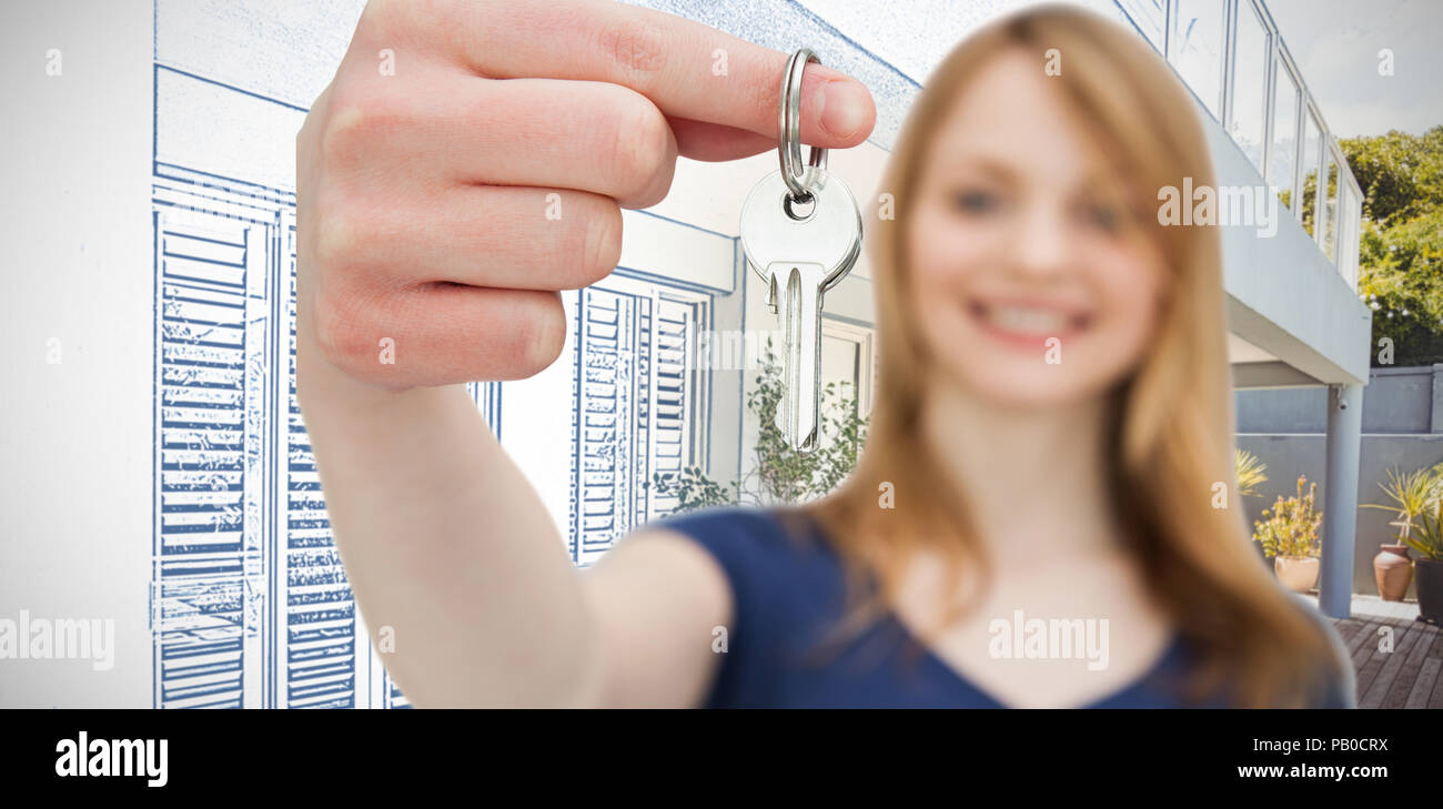 Zusammengesetztes Bild der Fokus auf eine Frau hält einen Schlüssel gedreht Stockfoto