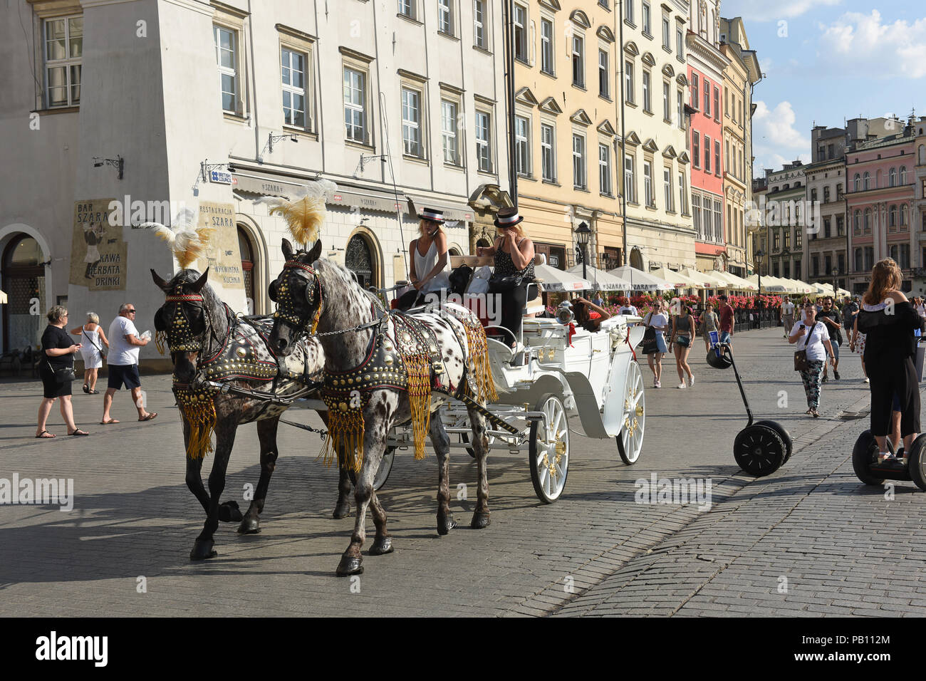 Kutsche im Marktplatz von Krakau Polen Stockfoto