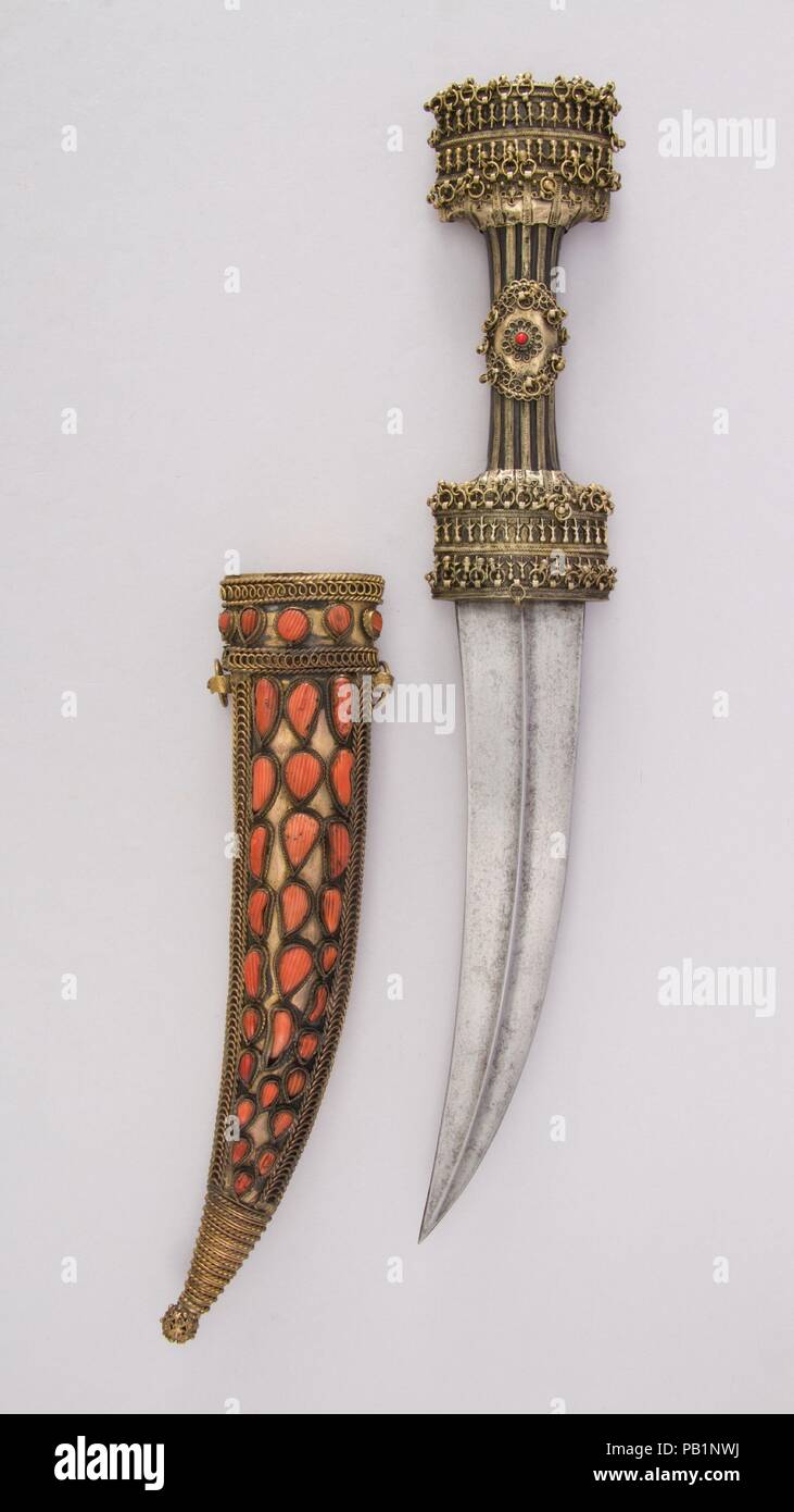 Dolch (Jambiya) mit Scheide. Kultur: Albanisch. Abmessungen: H. mit Scheide 18 3/8 in. (46,7 cm); H. ohne Scheide 16 cm. (42,5 cm); H. von Blade 9 1/4 in. (23,5 cm); W. 2 3/4 in. (7 cm); Wt. 15 oz. (425.2 g); Gew. der Ummantelung 9.8 oz. (277,8 g). Datum: 18. Museum: Metropolitan Museum of Art, New York, USA. Stockfoto