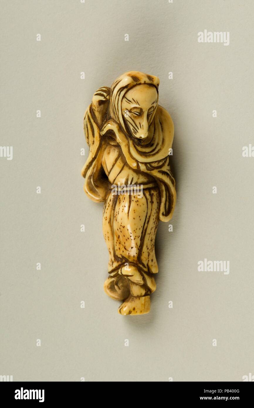 Netuske mit Fox von der Kyogen Spielen 'Hakuzosu'. Kultur: Japan. Abmessungen: H. 2 1/2 in. (6,4 cm); W. 1. (2,5 cm); D. 3/4 in. (1,9 cm). Datum: 19. Museum: Metropolitan Museum of Art, New York, USA. Stockfoto