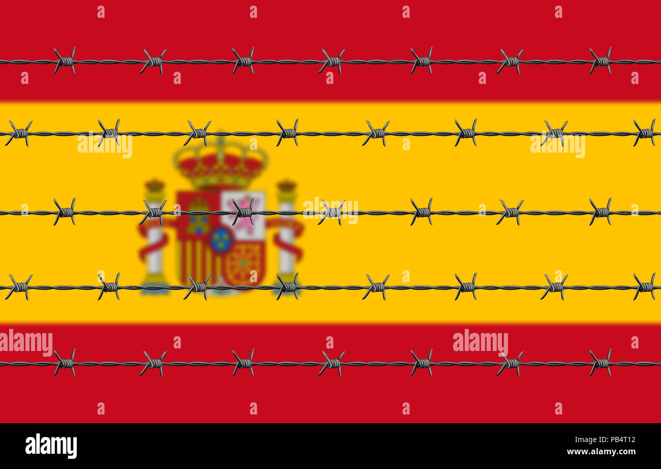 Stacheldraht Vor. Spanische Flagge hinter sich. Stockfoto