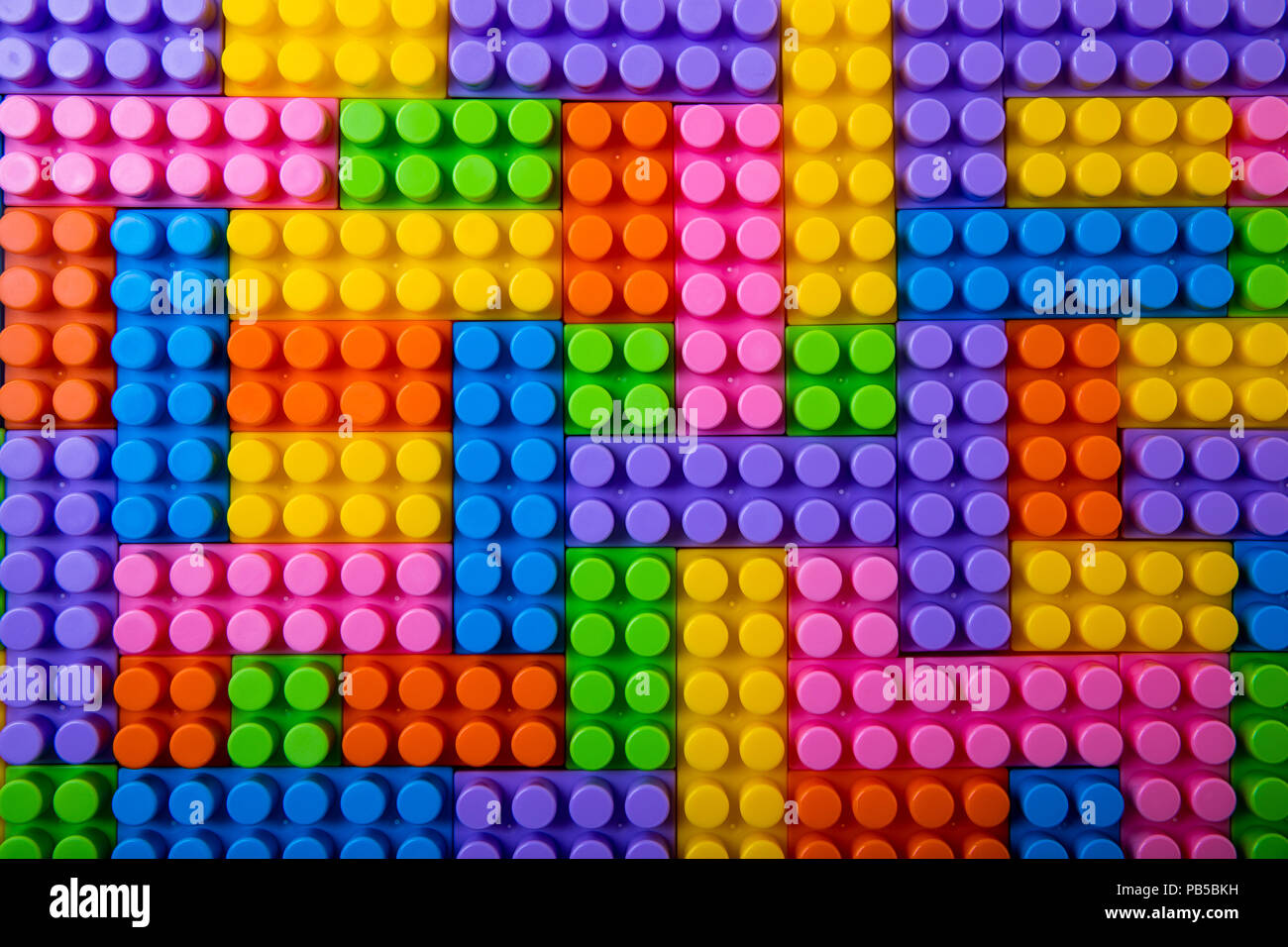 Spielzeug Kunststoff Bausteine Hintergrund. top View Stockfoto