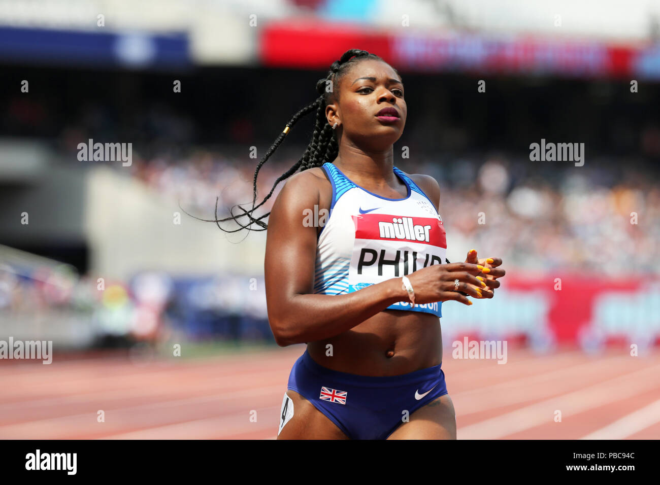 Asha PHILIP (Großbritannien) Überqueren der Ziellinie in der Frauen 100m 2 im Jahr 2018, IAAF Diamond League, Jubiläum Spiele, Queen Elizabeth Olympic Park, Stratford, London, UK. Stockfoto