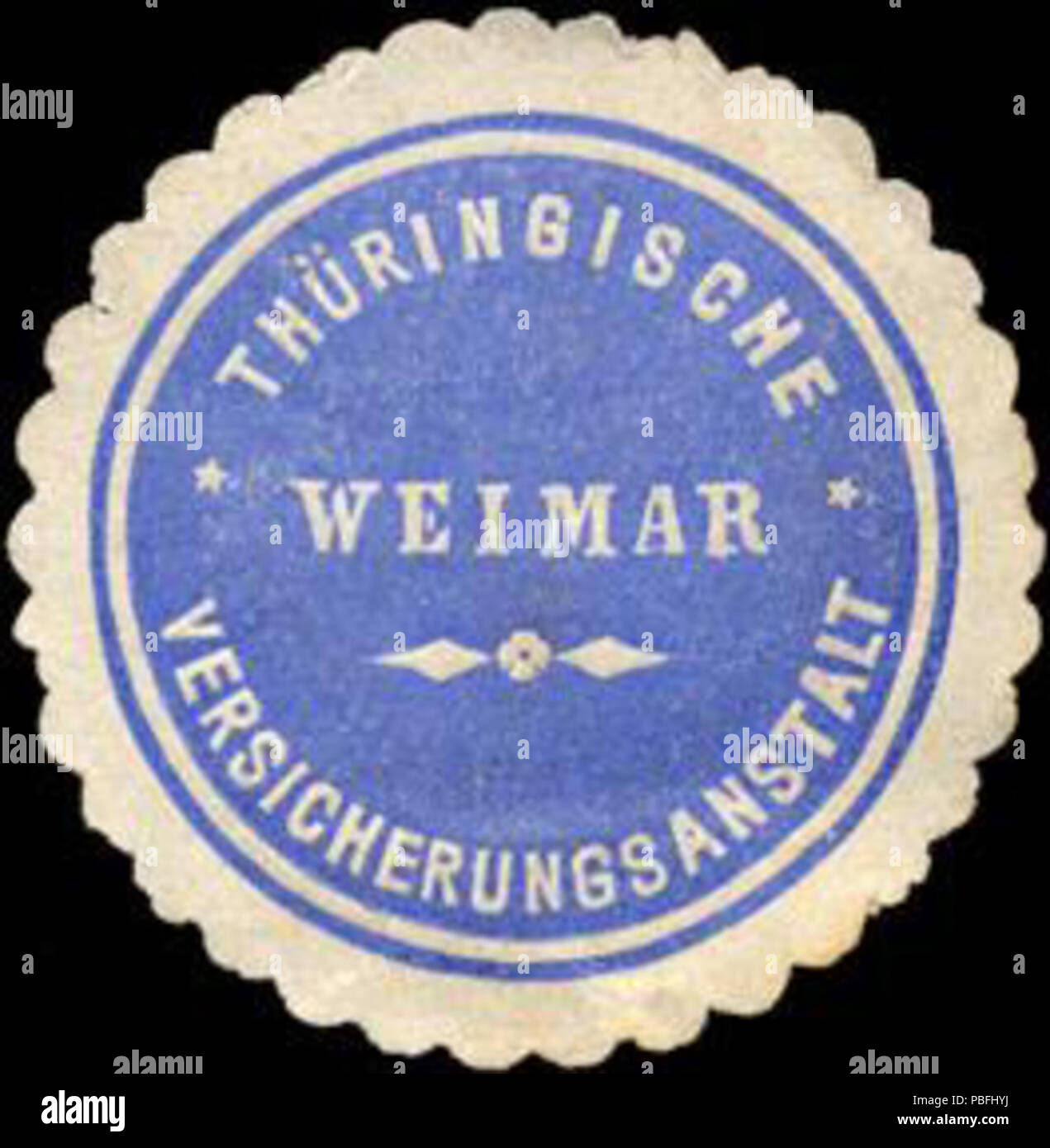 Alte Briefverschlussmarke aus Papier, welche seit ca. 1850 von Behoerden, Anwaelten, Notaren und Firmen zum Verschliessen der Post verwendet wurde. 1532 Siegelmarke Thüringische Versicherungsanstalt Weimar W 0212000 Stockfoto