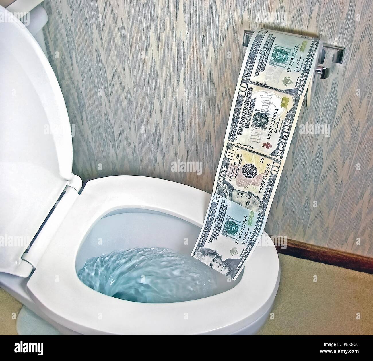 Spülen Geld in die Toilette Stockfotografie - Alamy