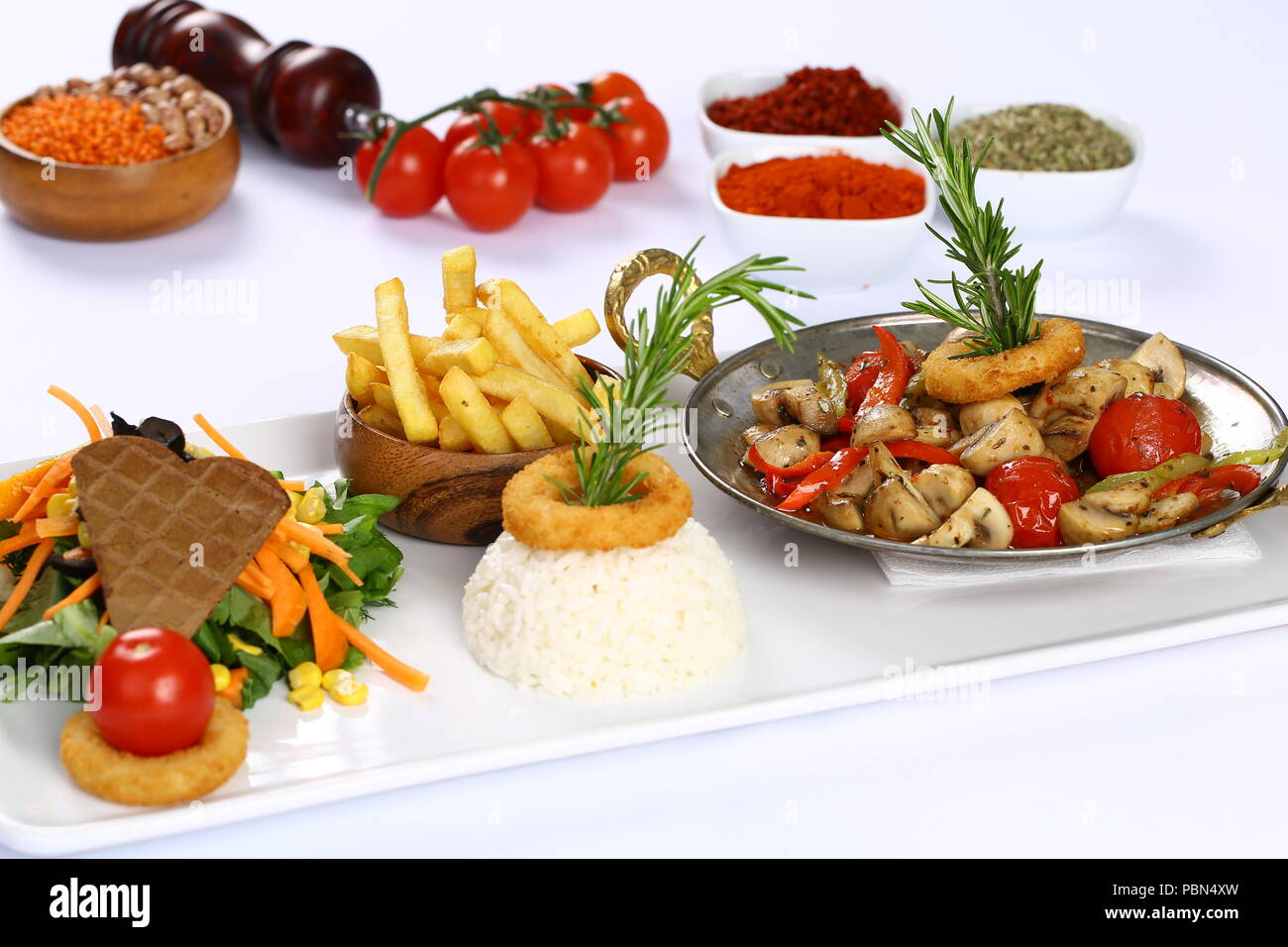 Pilz Scheiben braten in einer Pfanne Stockfoto