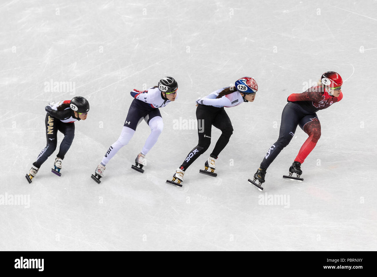 Kim EIN-Lang (KOR) Nr. 128, Marianne St Gelais (können) #2, Sumire Kikuchi (JPN) #27 und konkurrieren in der Short Track Frauen 1000 m Lana Gehring (USA) #134 er Stockfoto