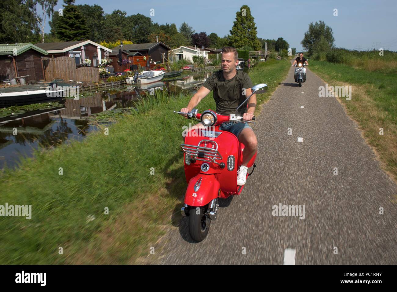Motorroller in Amsterdam Stockfoto