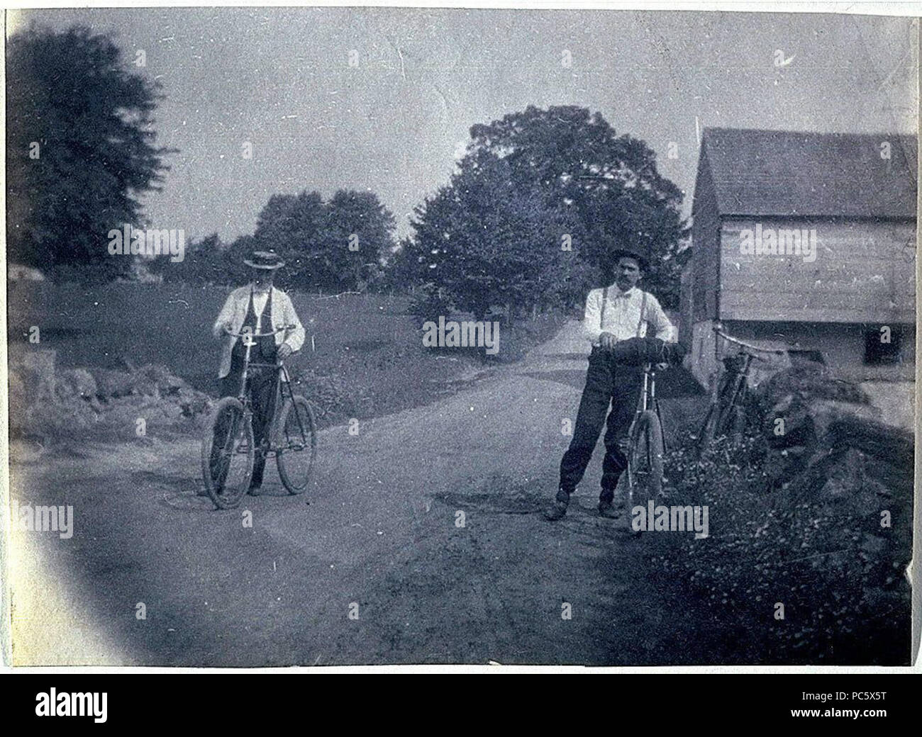 13 Benjamin Eakins und Samuel Murray mit Fahrrädern Stockfoto