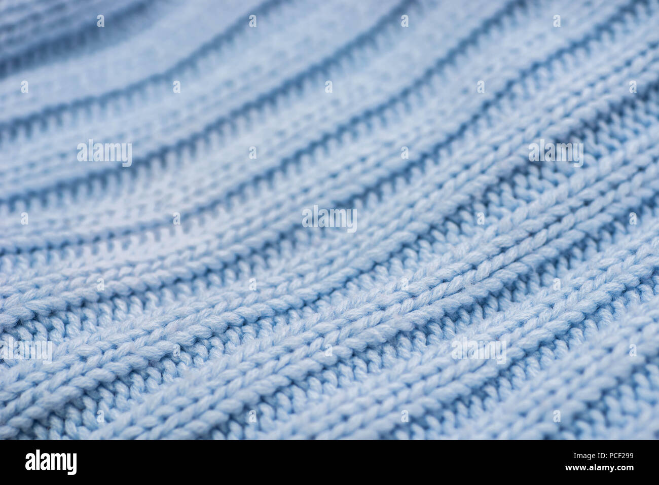 Blaue Farbe winkte Strickwaren Textur Hintergrund Makro Stockfoto