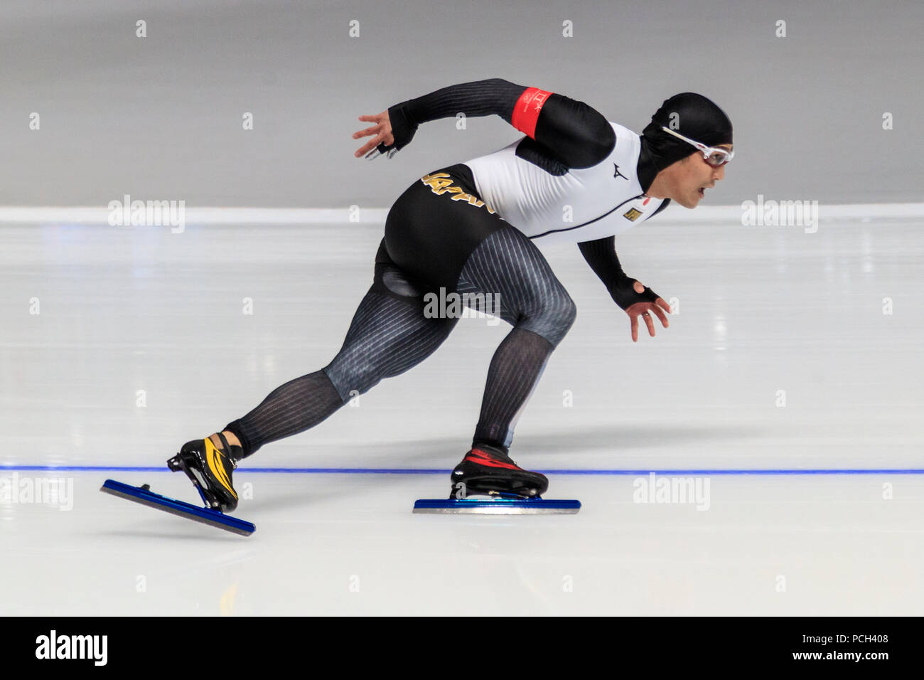 Konkurrieren in der Eisschnelllauf - Mens' 500 m bei den Olympischen Winterspielen PyeongChang 2018 Stockfoto
