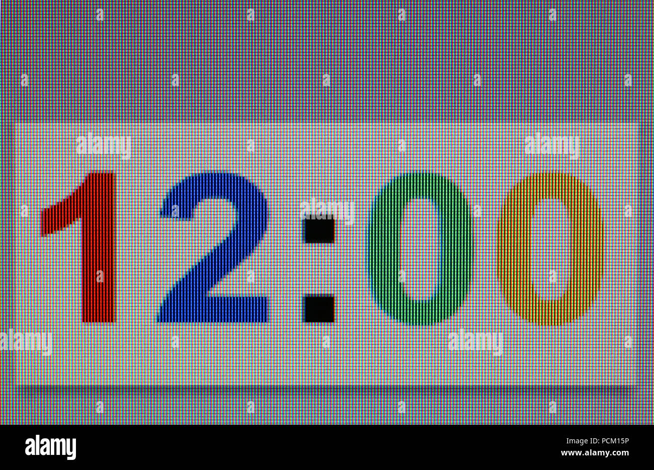 Das Makro Foto der Zahl zwölf Uhr 0 Minuten auf dem Computer Monitor. Ein gut gesehen Farbe pixesl Struktur Stockfoto