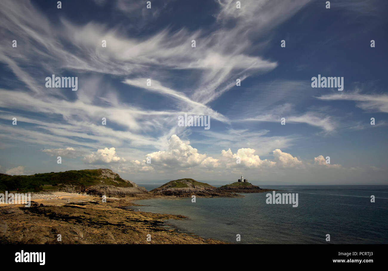 Mumbles Head Lighthouse unter einem grossen Himmel. South Wales Stockfoto