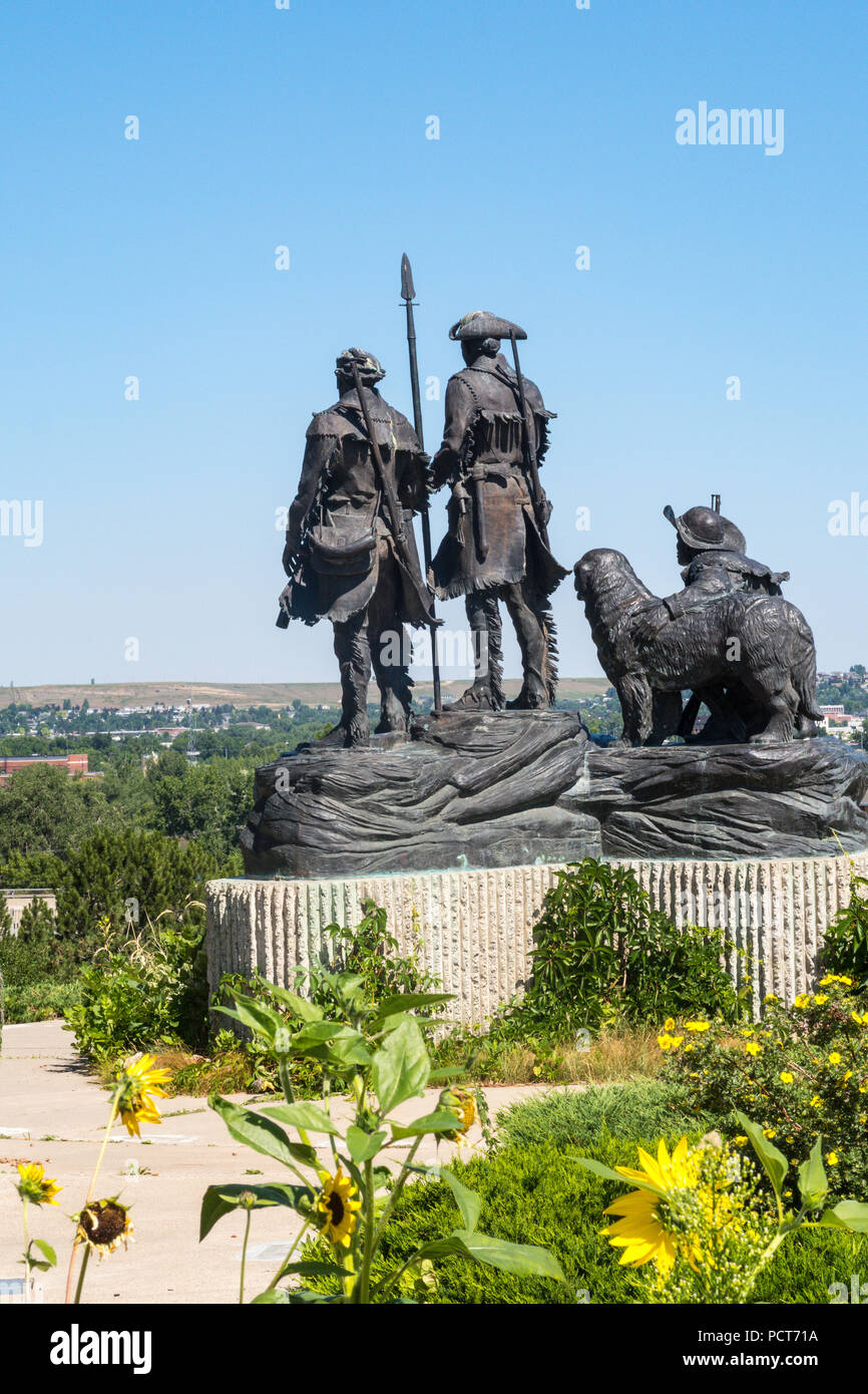 "Forscher an der Portage" Lewis und Clark Statue mit Blick auf Great Falls, MT, USA Stockfoto