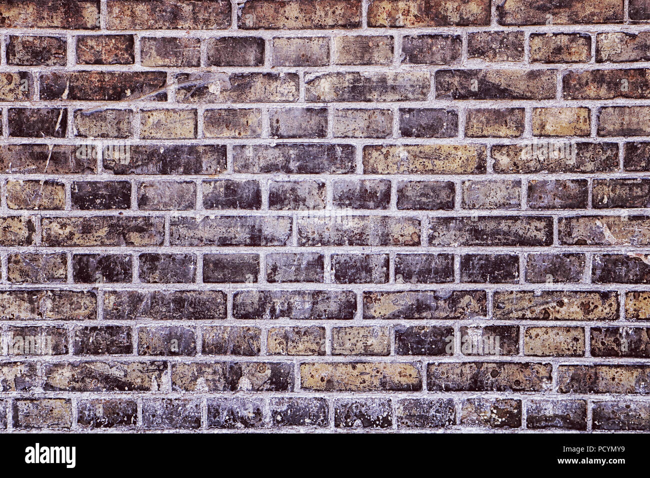 Architektonischen Hintergrund, antike Ziegel und Mörtel Wand der industriellen Gebäude Stockfoto