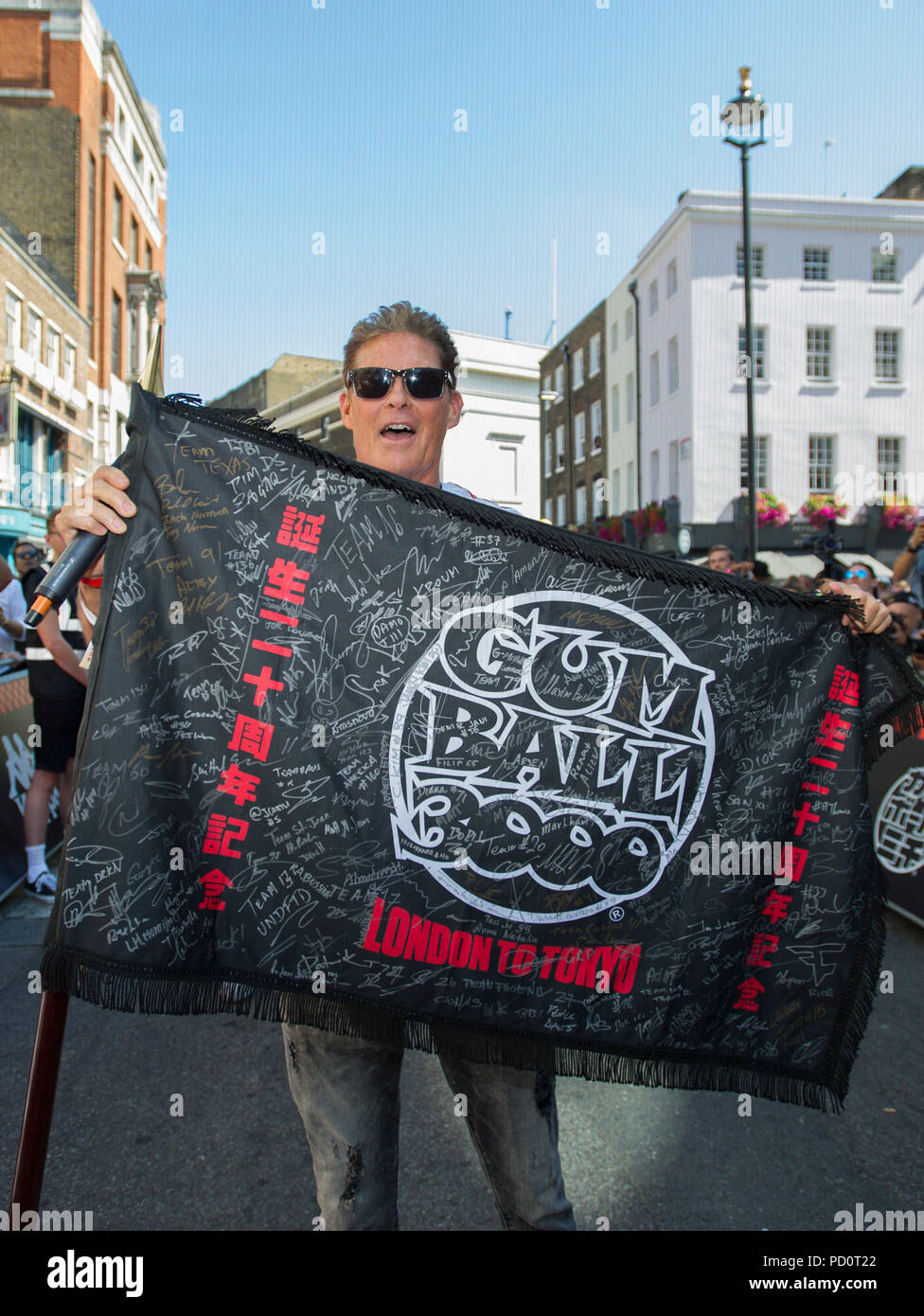 David Hasselhoff an der Produkteinführung und flag Rückgang für die Gumball 3000, eine jährliche Reise das Geld wirft eine Vielzahl von Nächstenliebe zu unterstützen, im Zentrum von London. Stockfoto