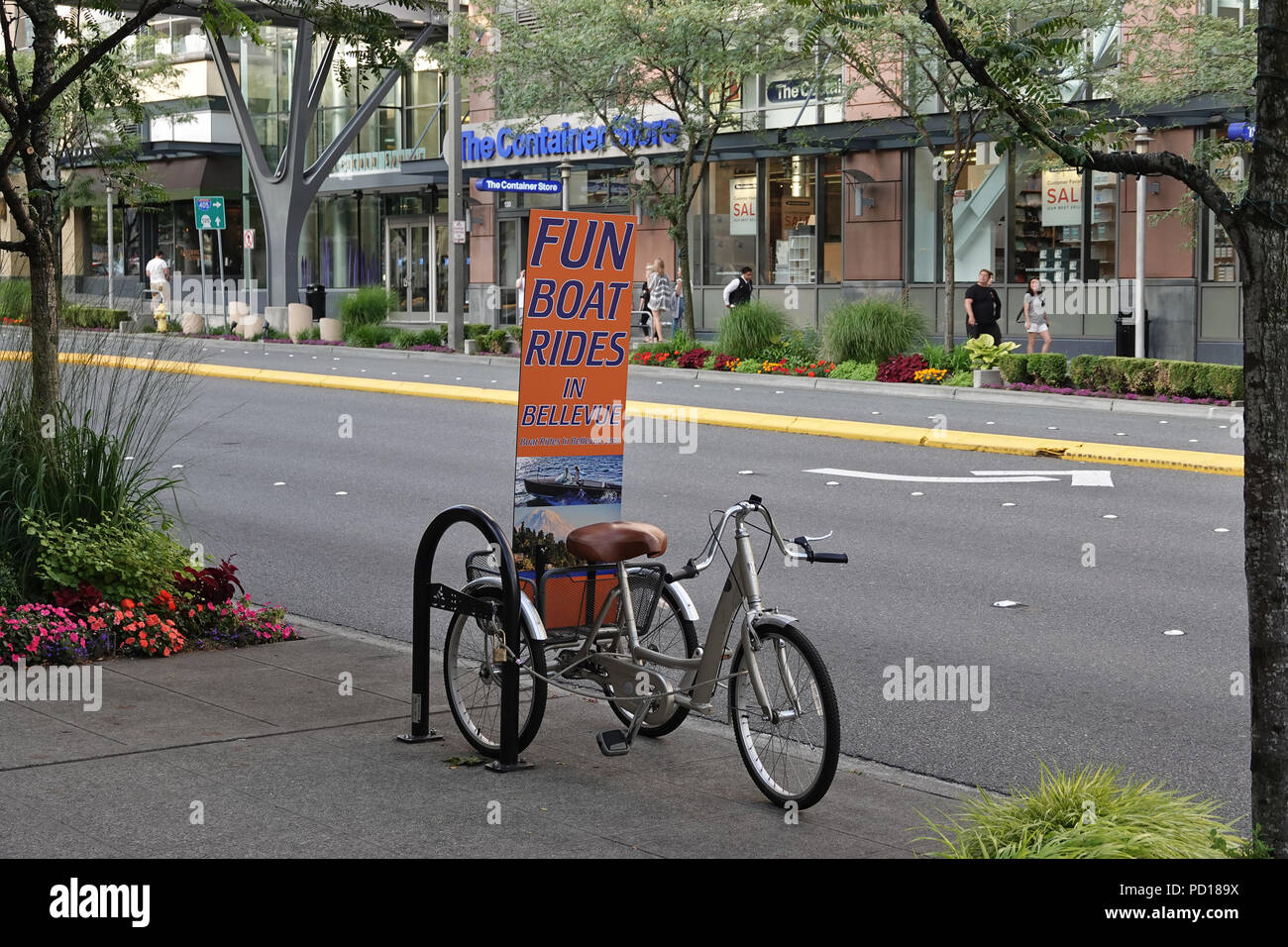 Dreirad mit "lustige Bootsfahrten in Bellevue"-Anzeige Stockfoto