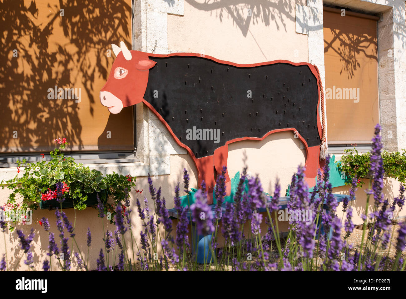 Eine Kuh Wandbild in Massignac, Frankreich. Stockfoto