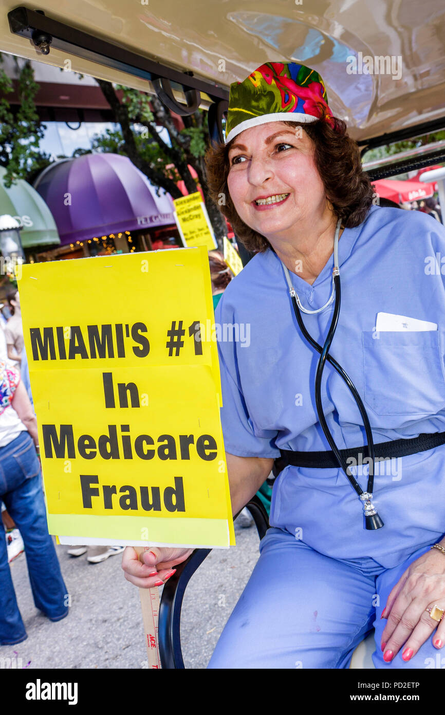 Miami Florida, Miami Dade County, Coconut Grove, King Mango Strut, jährlich, Gemeinschaftsveranstaltung, Parade, Satire, Parodie, Schild, Logo, Poster, Erwachsene Erwachsene Frau Frauen f Stockfoto