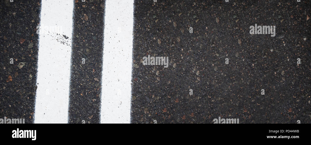 Kennzeichnung auf dem Asphalt Textur Straße Hintergrund Stockfoto