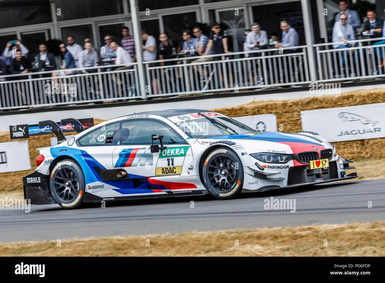 2018 BMW M4 DTM mit Fahrer Ricky Collard am Goodwood Festival 2018 von Geschwindigkeit, Sussex, UK. Stockfoto