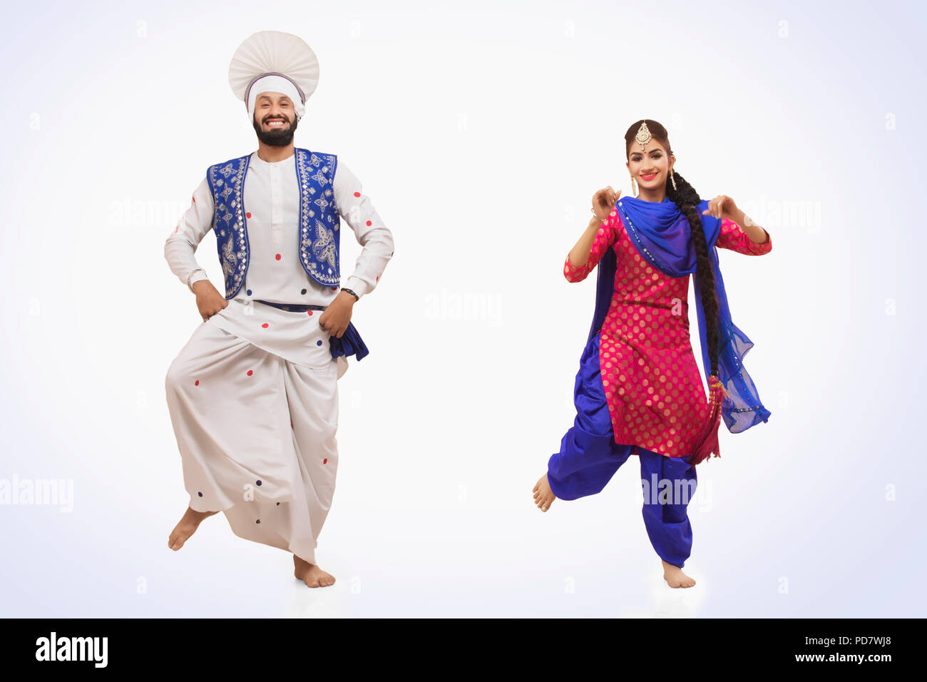 Sikh Paar tun Bhangra Tanz Stockfoto