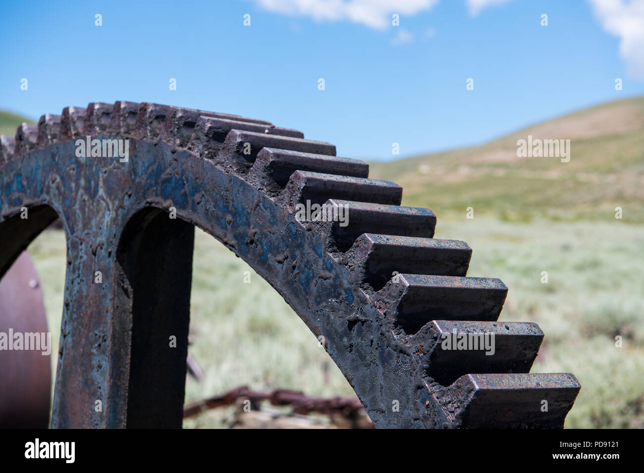 Nahaufnahme einer alten industriellen rostiges Zahnrad in der Geisterstadt Bodie, Kalifornien in der Geisterstadt Bodie, Kalifornien Stockfoto
