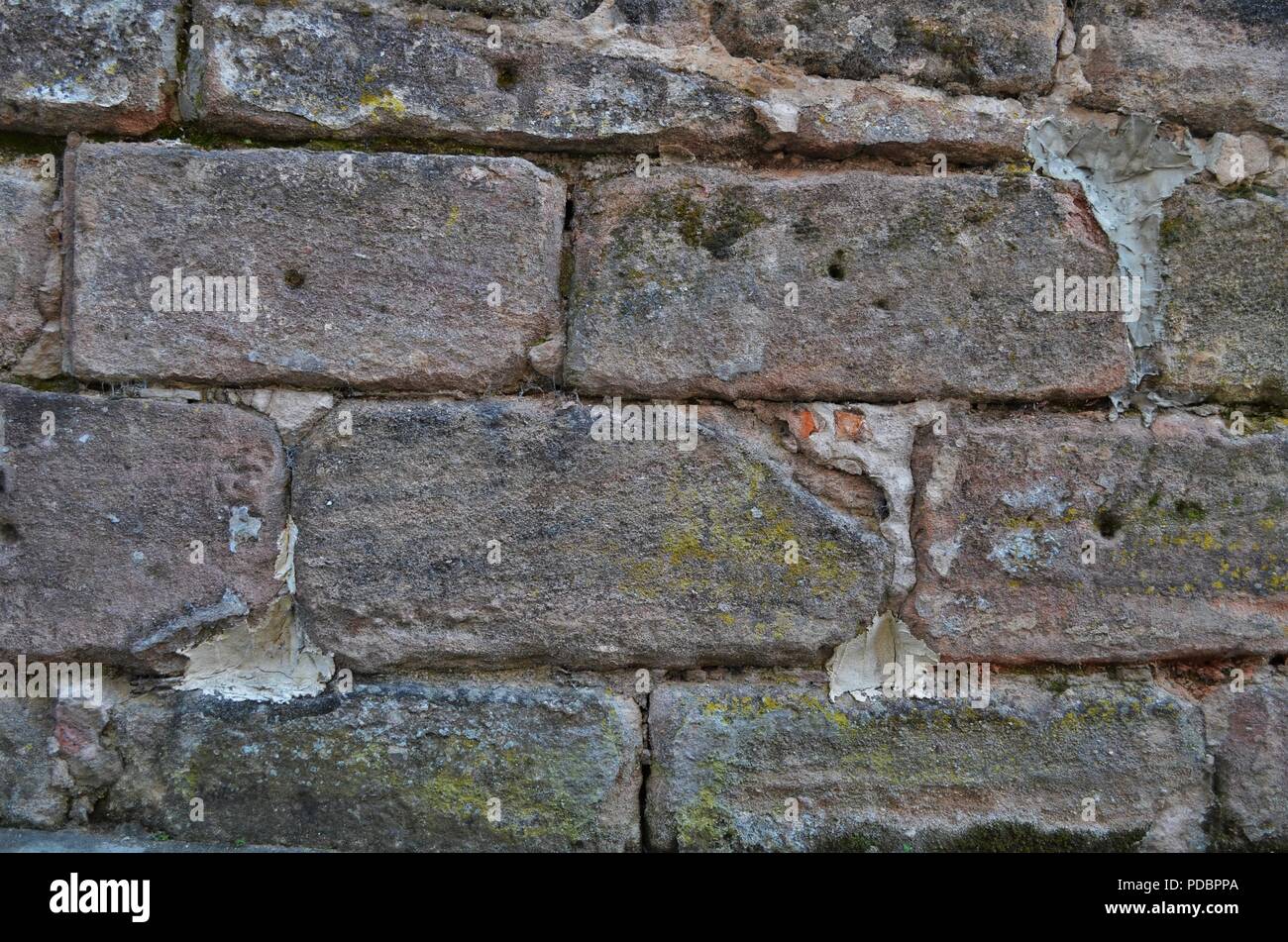 Textur eines alten Sandsteinmauer in wallpaper Format shot in