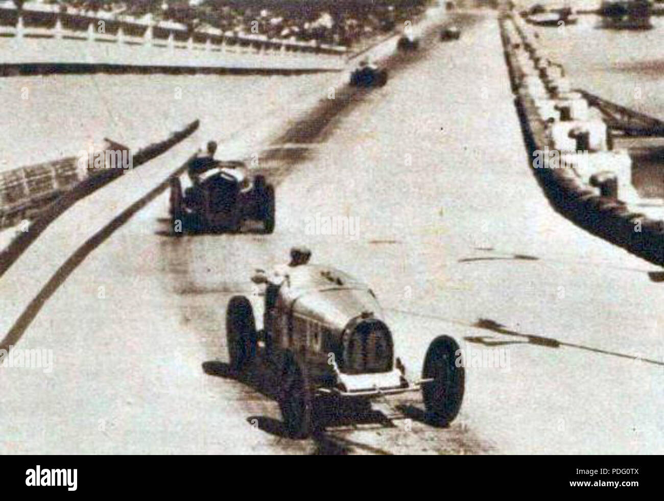 144 Grand Prix de Monaco 1933, Varzi devant Nuvolari le Long du Port Stockfoto