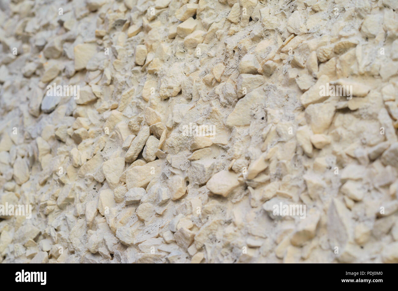 Kiesel Gips Wand Hintergrund Stockfoto