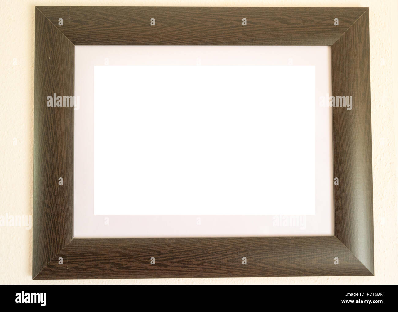 Leere Holzrahmen mit weißen Bereich auf zu schreiben Stockfoto