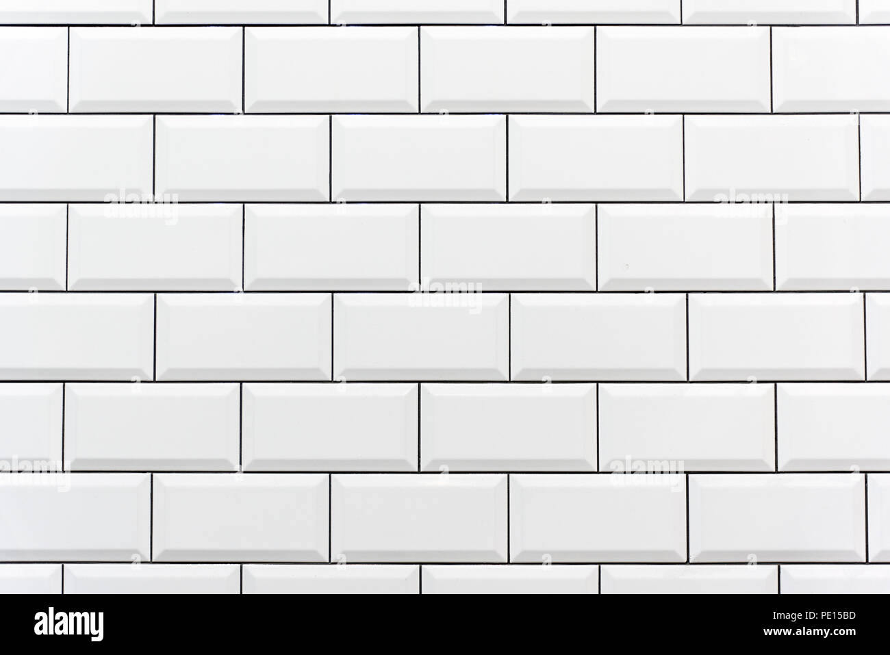 Hintergrund von einem weiß gefliesten Wand Stockfoto